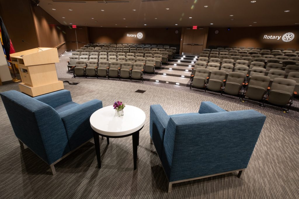 3rd Floor Auditorium at One Rotary Place. Photo of a large theater and stage featuring a stage that can be customized for events.